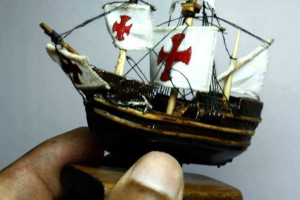 wooden-model-of-a-ship-with-a-red-cross