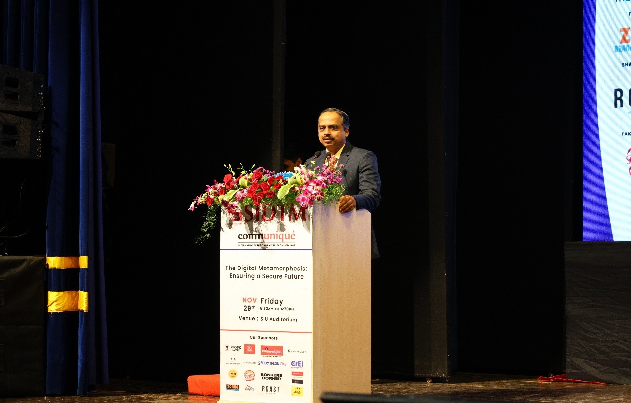 Director of SIDTM Pune addressing the audience at Communiqué 2026 digital and telecom seminar