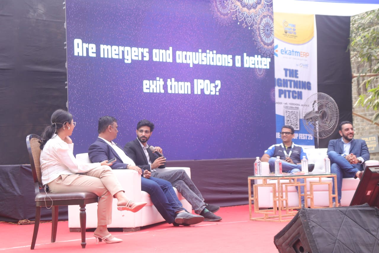 Panel discussion on startup exit strategies during a Lightning Pitch session