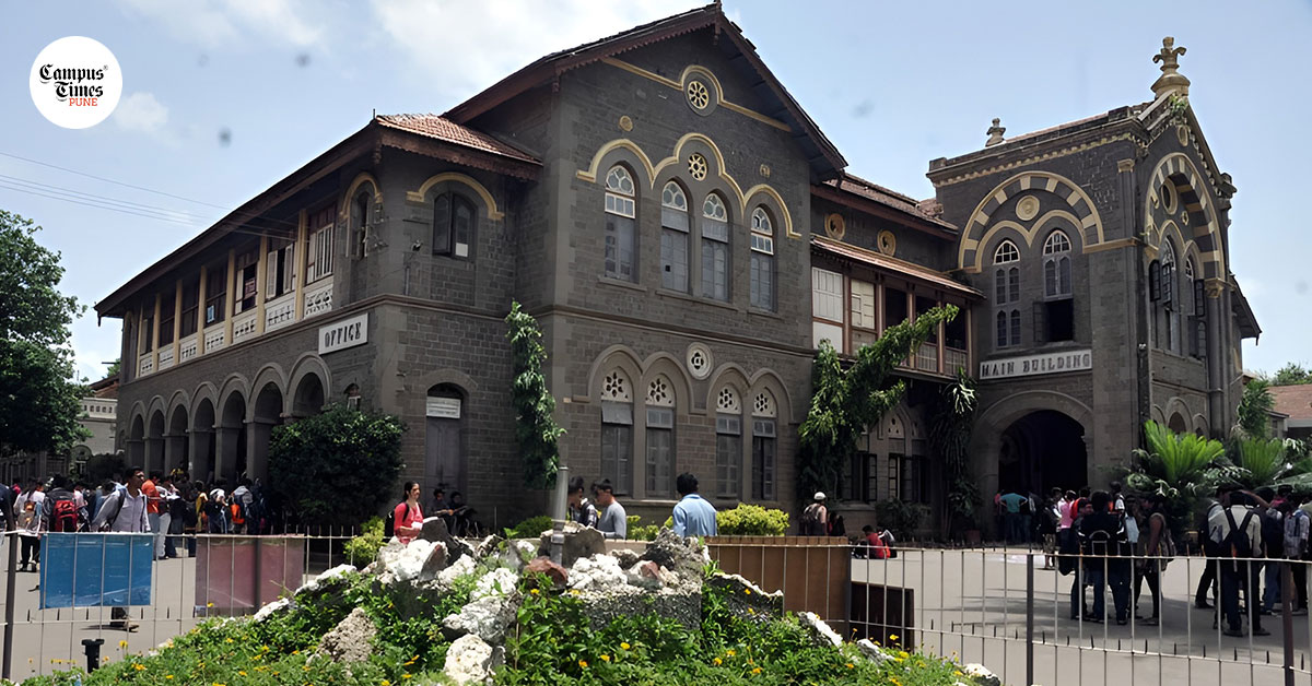 Students gathered outside a historic college main building in Pune during regular campus hours