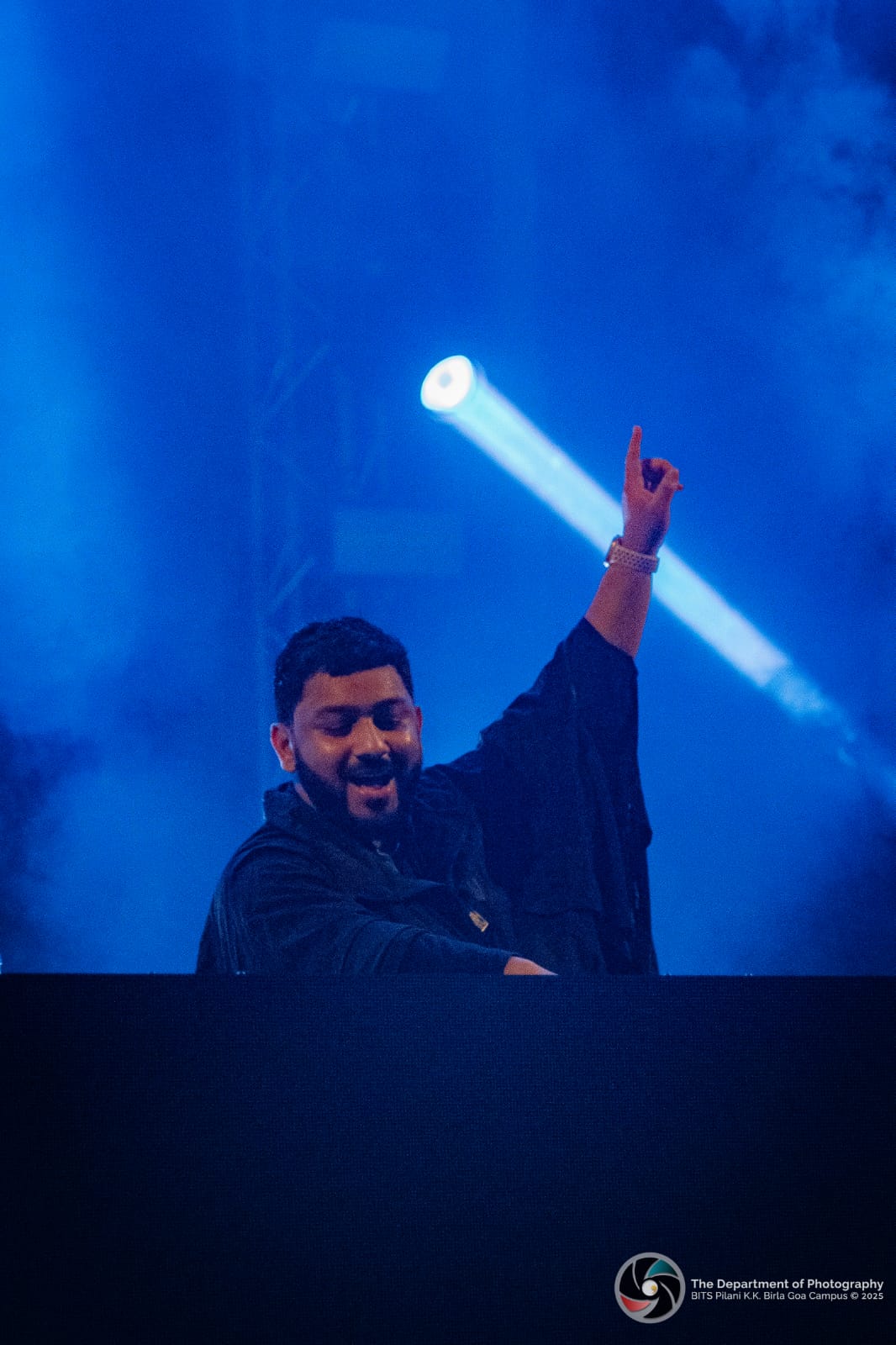 DJ performance lighting up the crowd during QUARK 2026 evening celebrations