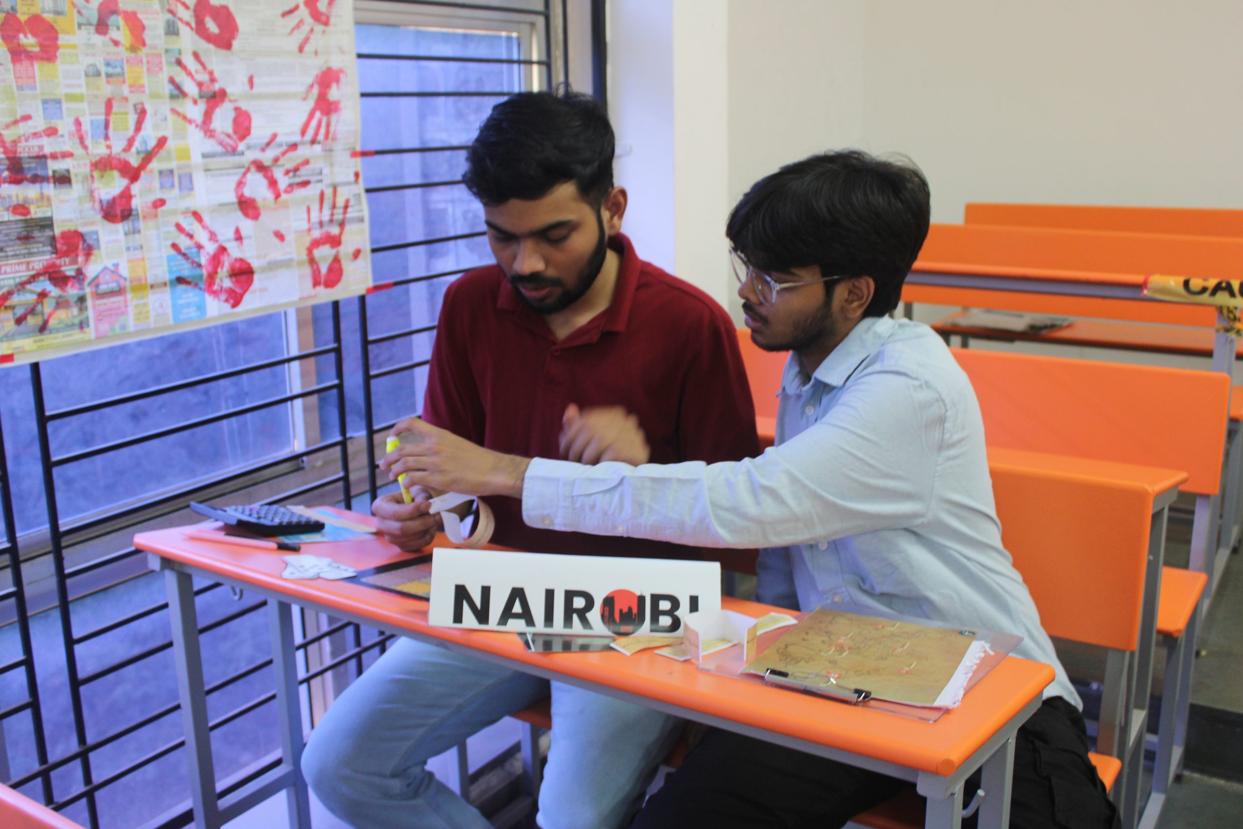 Teams analysing financial clues during Fraud Files competition at BMCC